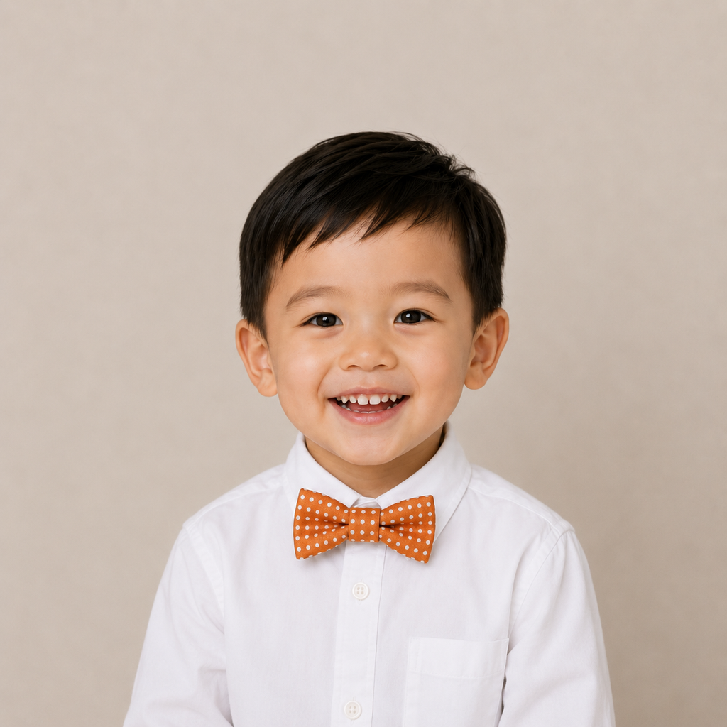 Orange Polka Dots boys bow tie for kids — handmade, pre-tied and adjustable