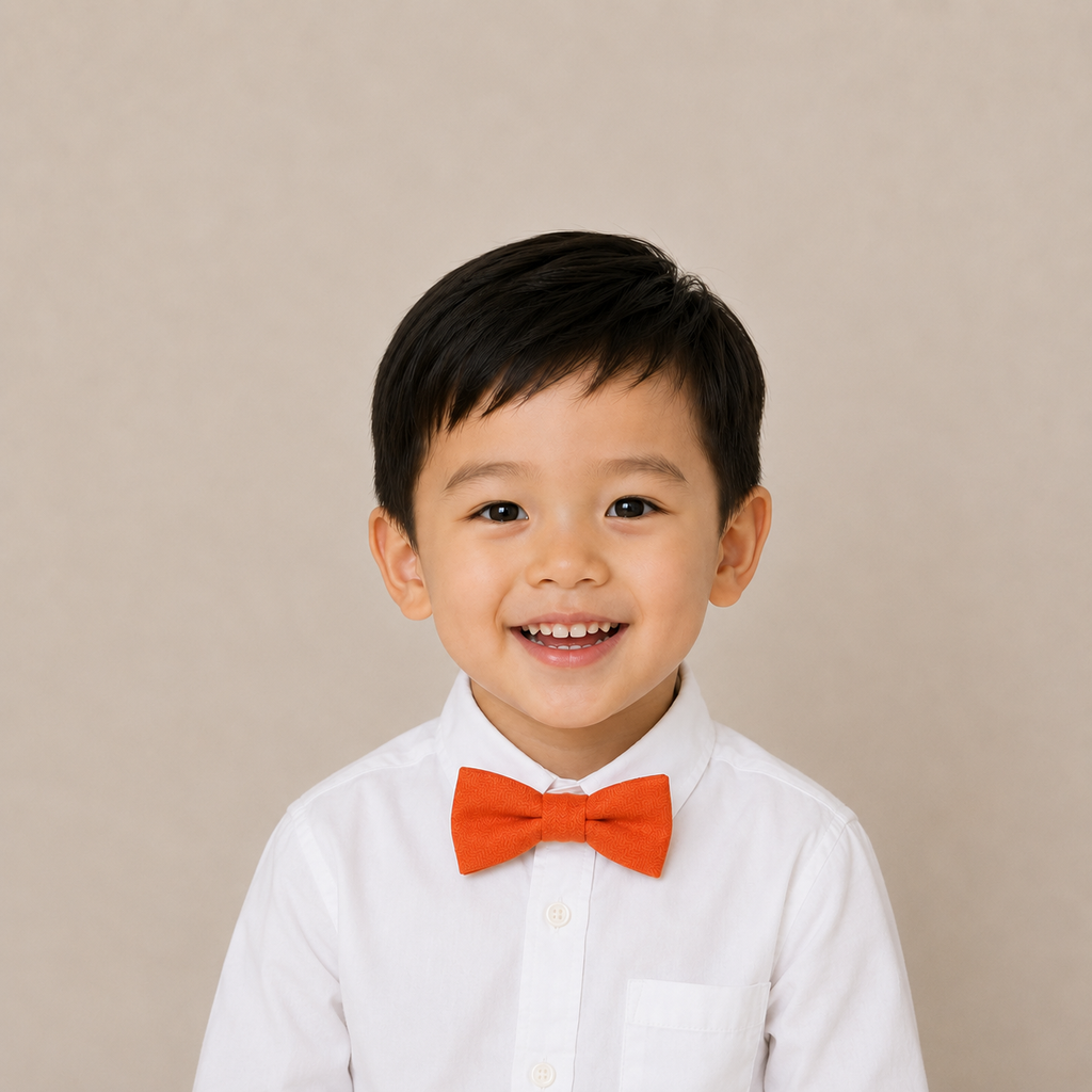 Orange boys bow tie for kids — handmade, pre-tied and adjustable
